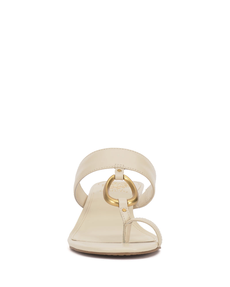 Front view of the Vince Camuto Kimena O-Ring Kitten Heel Sandal in beige, showcasing a wide strap with a gold O-ring buckle, minimalist thong toe loop design, and open toe.