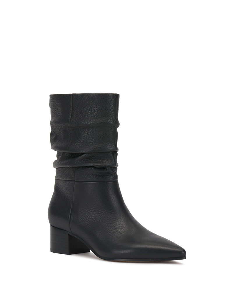 The Kuvania Bootie by Vince Camuto is a black leather mid-calf boot featuring a pointed toe, slouchy shaft, and low block heel, shown on a white background.