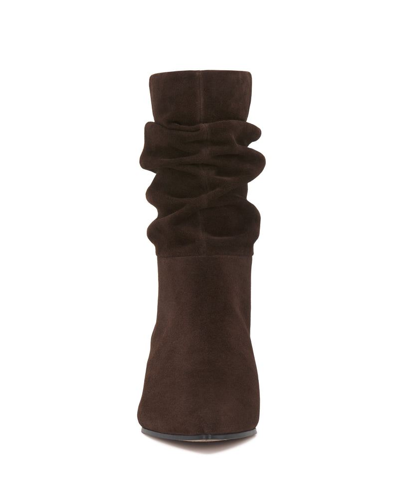 Front view of the Vince Camuto Kuvania Bootie in dark brown suede, featuring a rounded toe and a gathered, ruched design on the shaft.