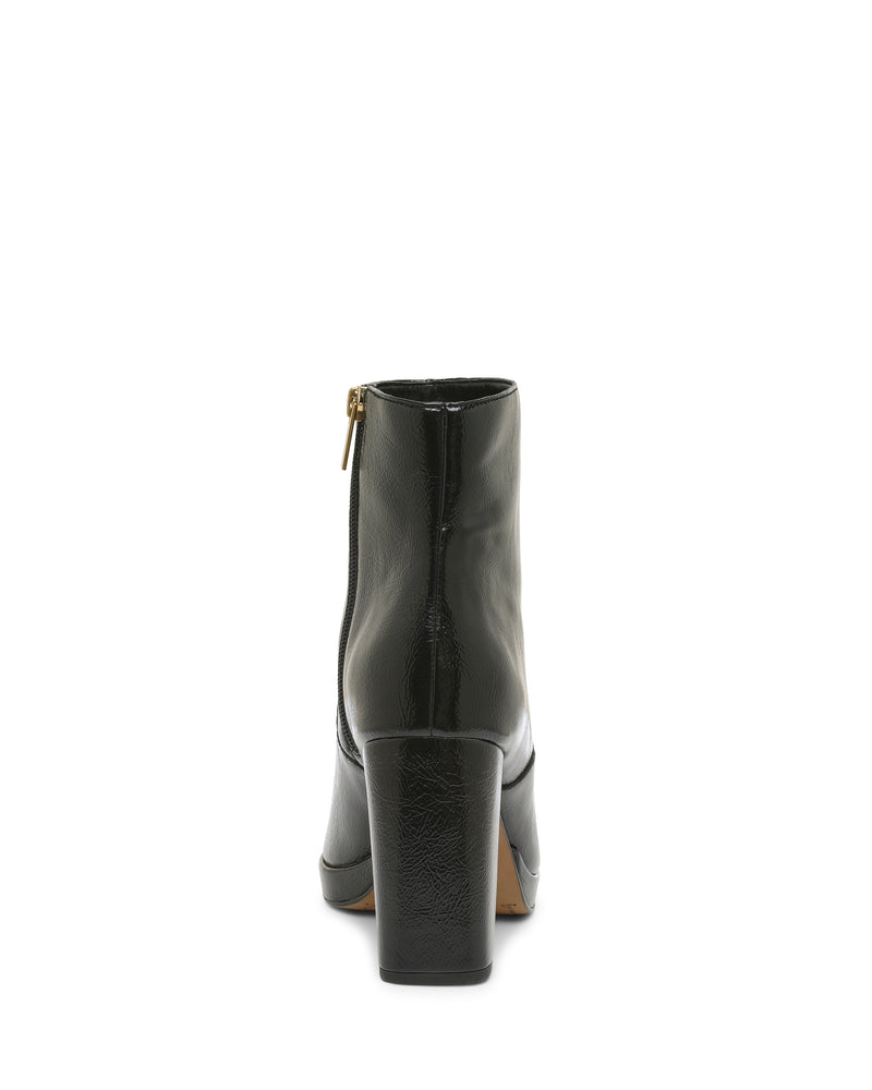 The Vince Camuto Laylei Bootie is a black, ankle-high bootie with a chunky block heel, viewed from the back. It features a visible side zipper and a smooth leather finish—a classic style from Vince Camuto.