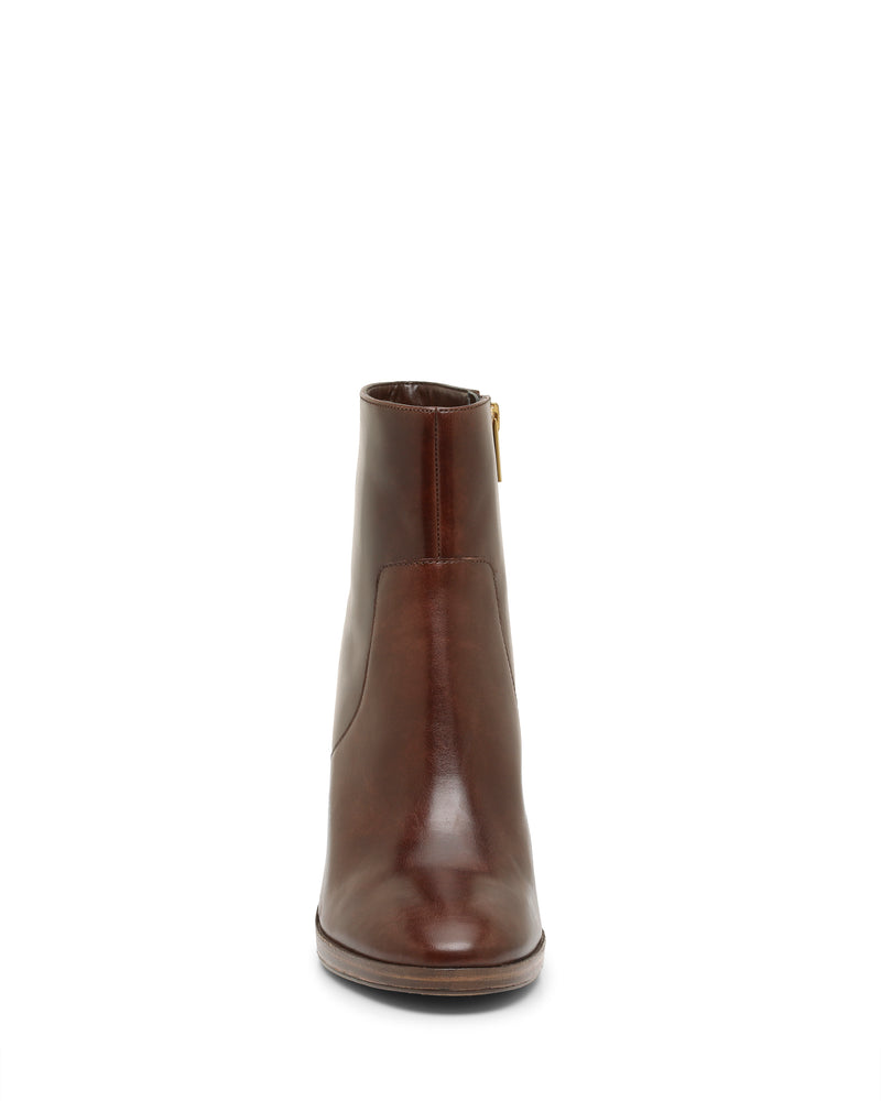 Front view of the Vince Camuto Laylei Bootie, an ankle-high brown leather bootie featuring a slight block heel and a side zipper, displayed against a white background.