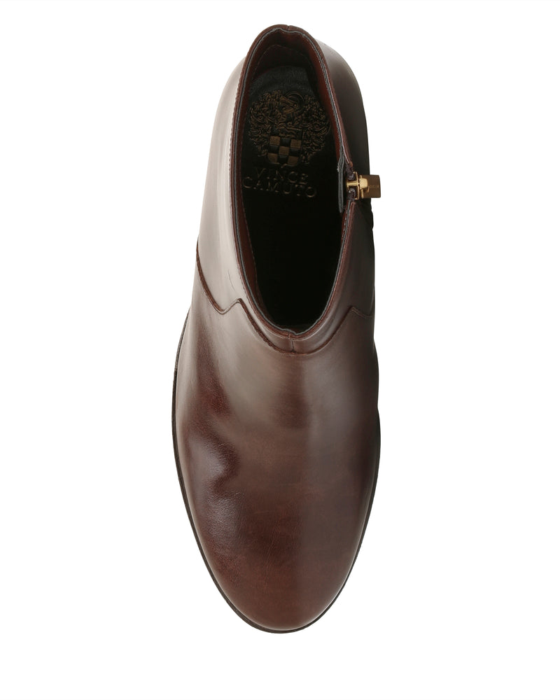 A single Vince Camuto Laylei Bootie in brown leather, shown from above with a rounded toe, side zipper, and subtle block heel, displayed against a white background.