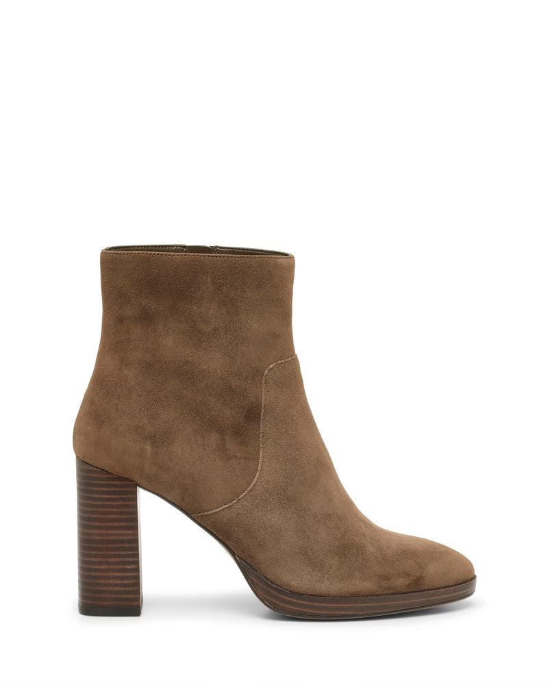 A Vince Camuto Laylei Bootie in brown suede, showcasing an ankle-high design with a tall stacked heel and a functional side zipper, is displayed in profile against a white backdrop.