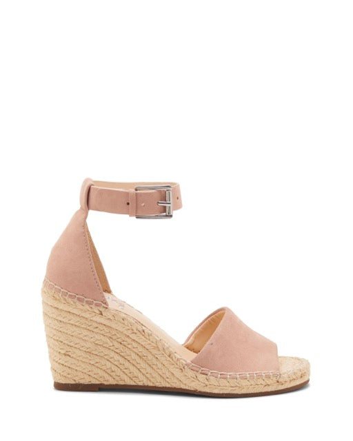The Leera Espadrille Wedge Sandal by Vince Camuto is shown in a side profile view on a white background, featuring blush pink suede with an ankle strap and buckle, an open toe design, and an espadrille-style woven rope platform.