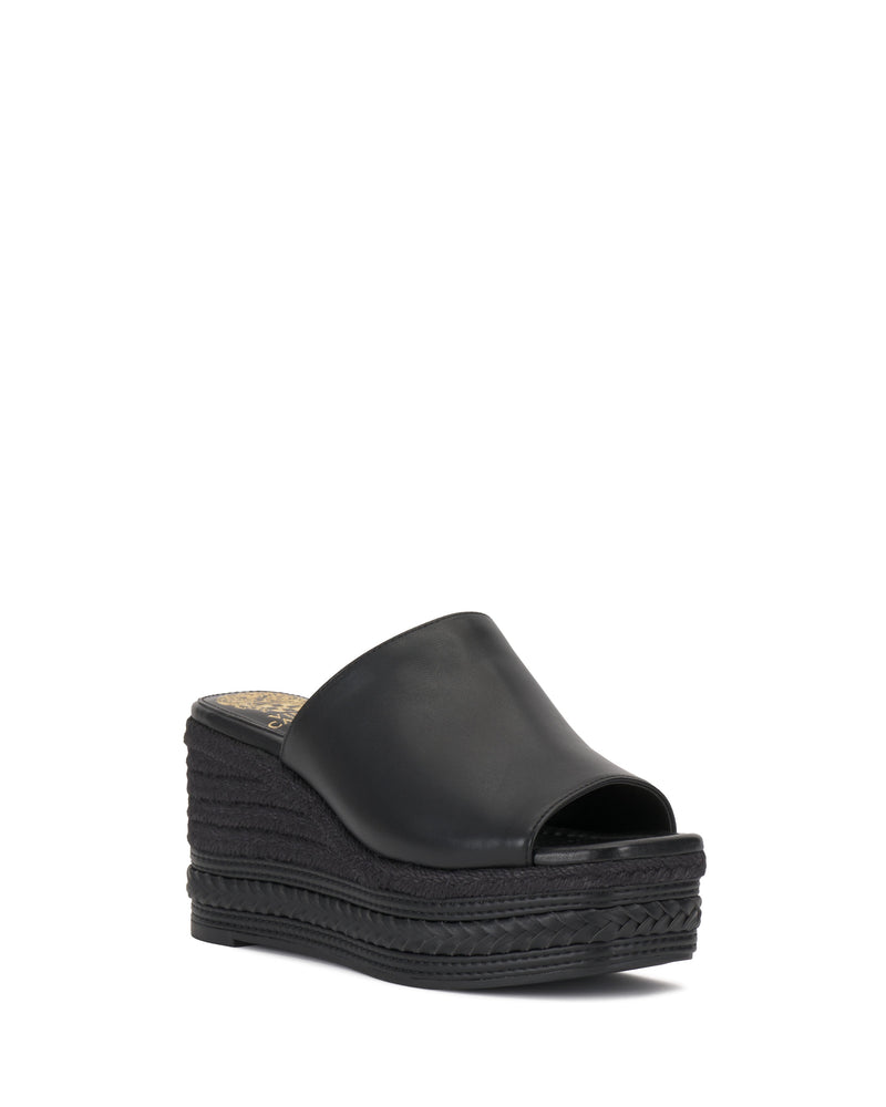 The Vince Camuto Lierna Espadrille Wedge Sandal features a black open toe design, thick platform sole, and woven base detailing—an ideal Y2K-inspired addition to your sandals collection.