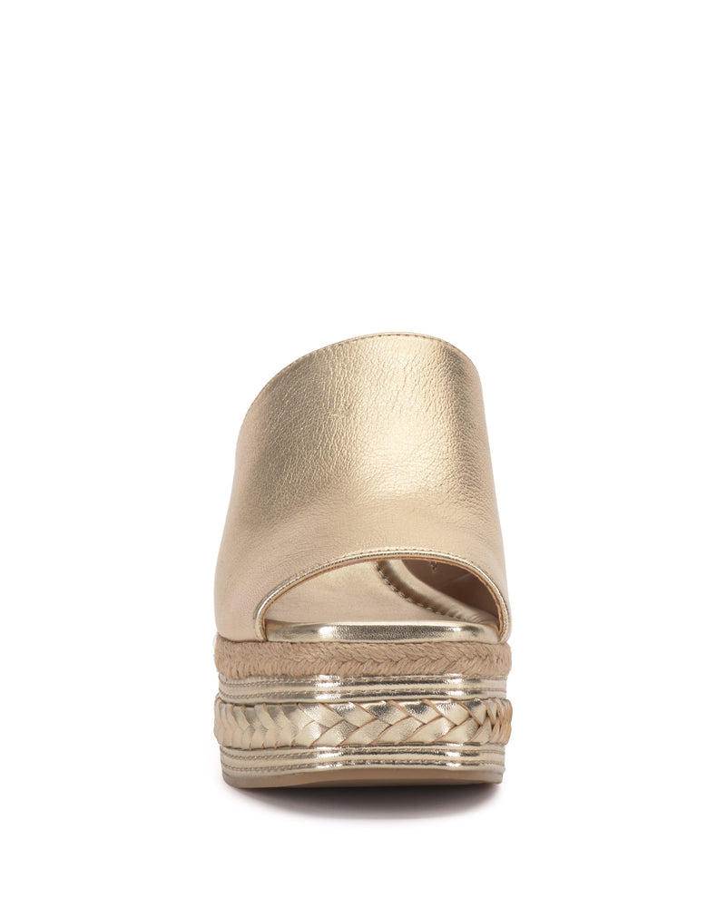 Front view of the Vince Camuto Lierna Espadrille Wedge Sandal, featuring a gold metallic finish, open toe, and woven espadrille platform around the sole.