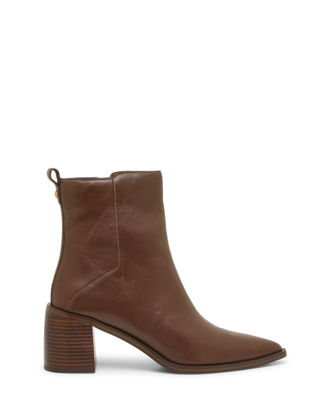 The Vince Camuto Lorelai Bootie is a brown leather ankle boot with a modern style, featuring a rounded pointed toe, side stitching details, a block heel, and a pull tab at the back, displayed against a white background.