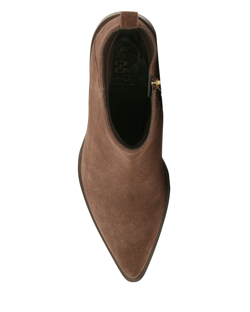 Top view of the Vince Camuto Lorelai Bootie—a single brown suede ankle boot with a pointed toe and side zipper, displayed against a white background—for a modern style that seamlessly blends sophistication with everyday versatility.