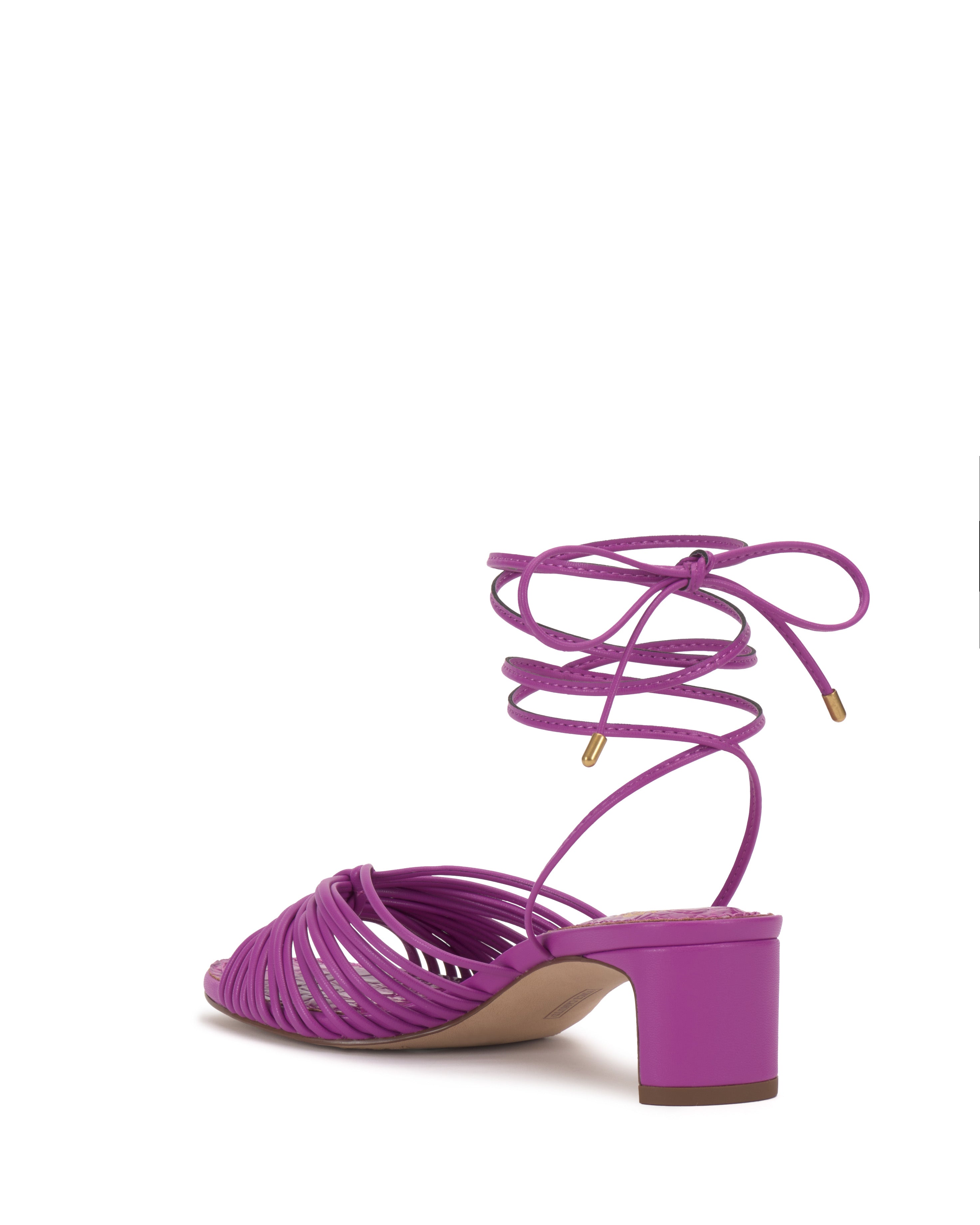 The Lory Kitten Heel Sandal by Vince Camuto features a purple strappy ankle-tie design with wrap-around laces and a block kitten heel, shown from the back on a white background.