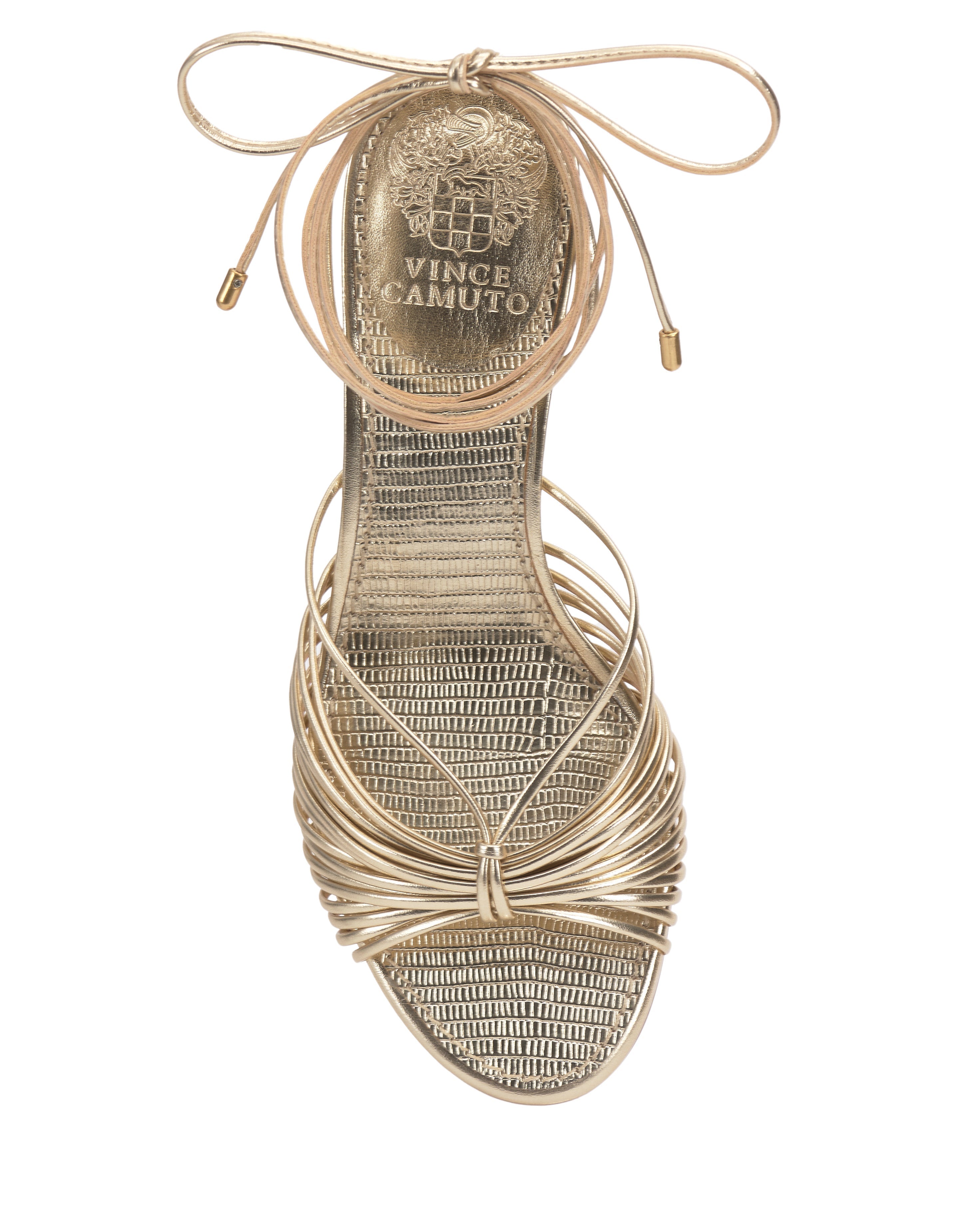 The Vince Camuto Lory Kitten Heel Sandal features gold strappy ankle tie lace-up straps, a textured insole, an open toe, and Vince Camuto branding printed in gold on the heel.