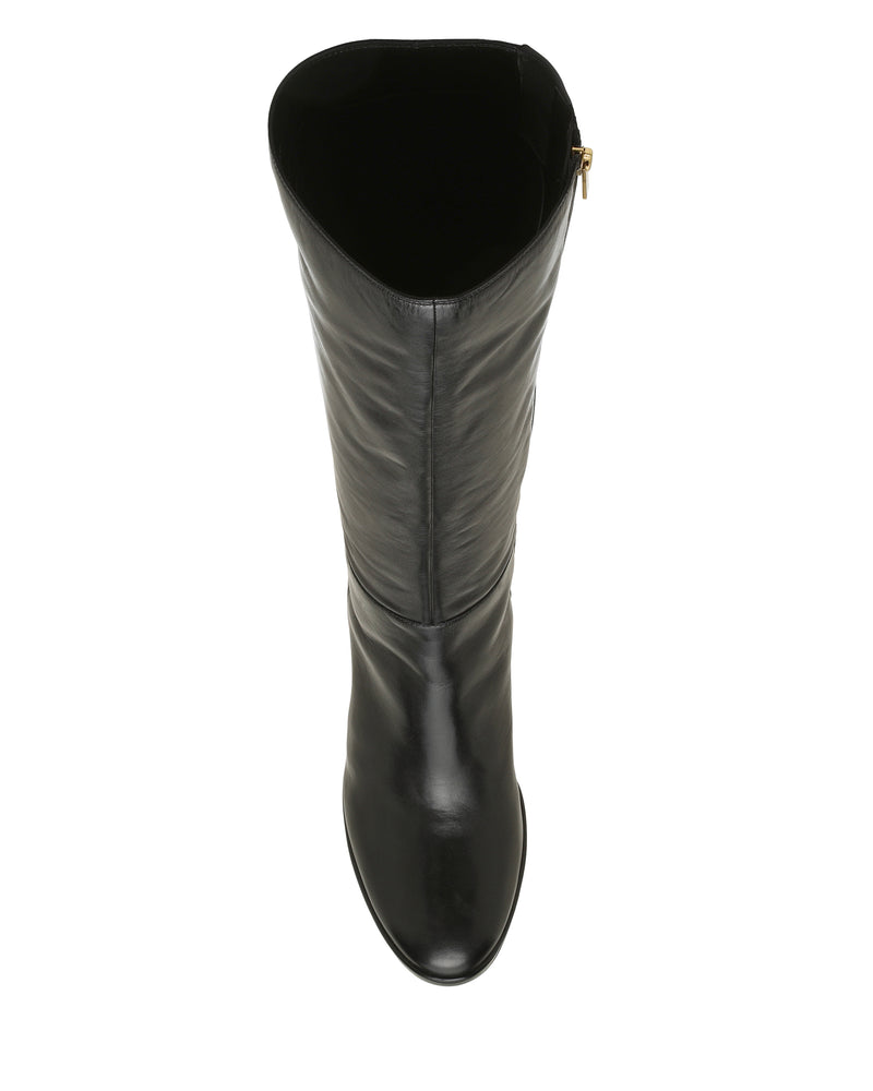 Top view of a single Vince Camuto Lucina Knee High Boot in tall black leather with a slight shine, displaying the shaft and rounded toe against a plain white background.
