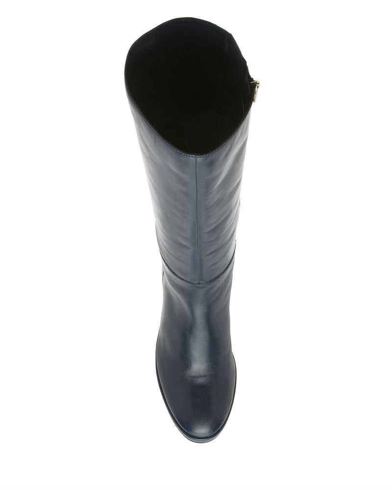 The Vince Camuto Lucina Knee High Boot is shown from above against a white background, highlighting its tall black leather shaft opening, smooth rounded toe, and elegant block heel.