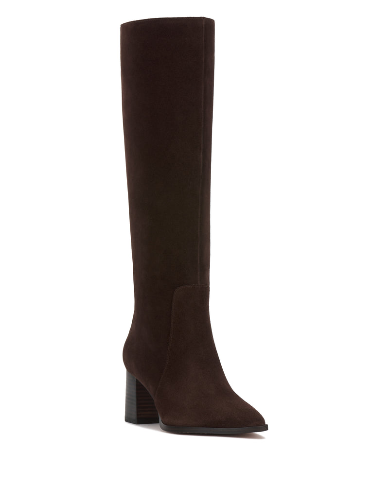The Vince Camuto Lumina Extra Wide Calf Knee High Boot in dark brown suede features a block heel and slightly pointed toe, offering timeless style and modern comfort. Shown as a single boot against a white background.