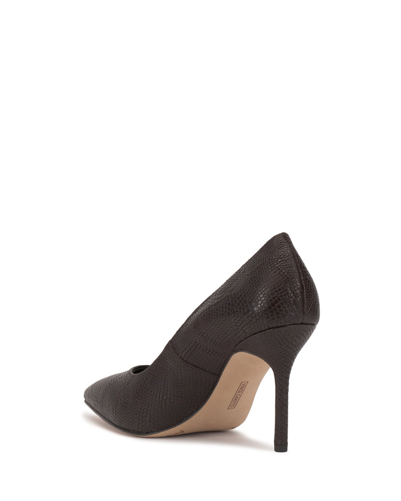 The Vince Camuto Maisha Pump is a single dark brown, textured high-heeled shoe with a pointed toe and stiletto heel, shown from the back-left on a white background.