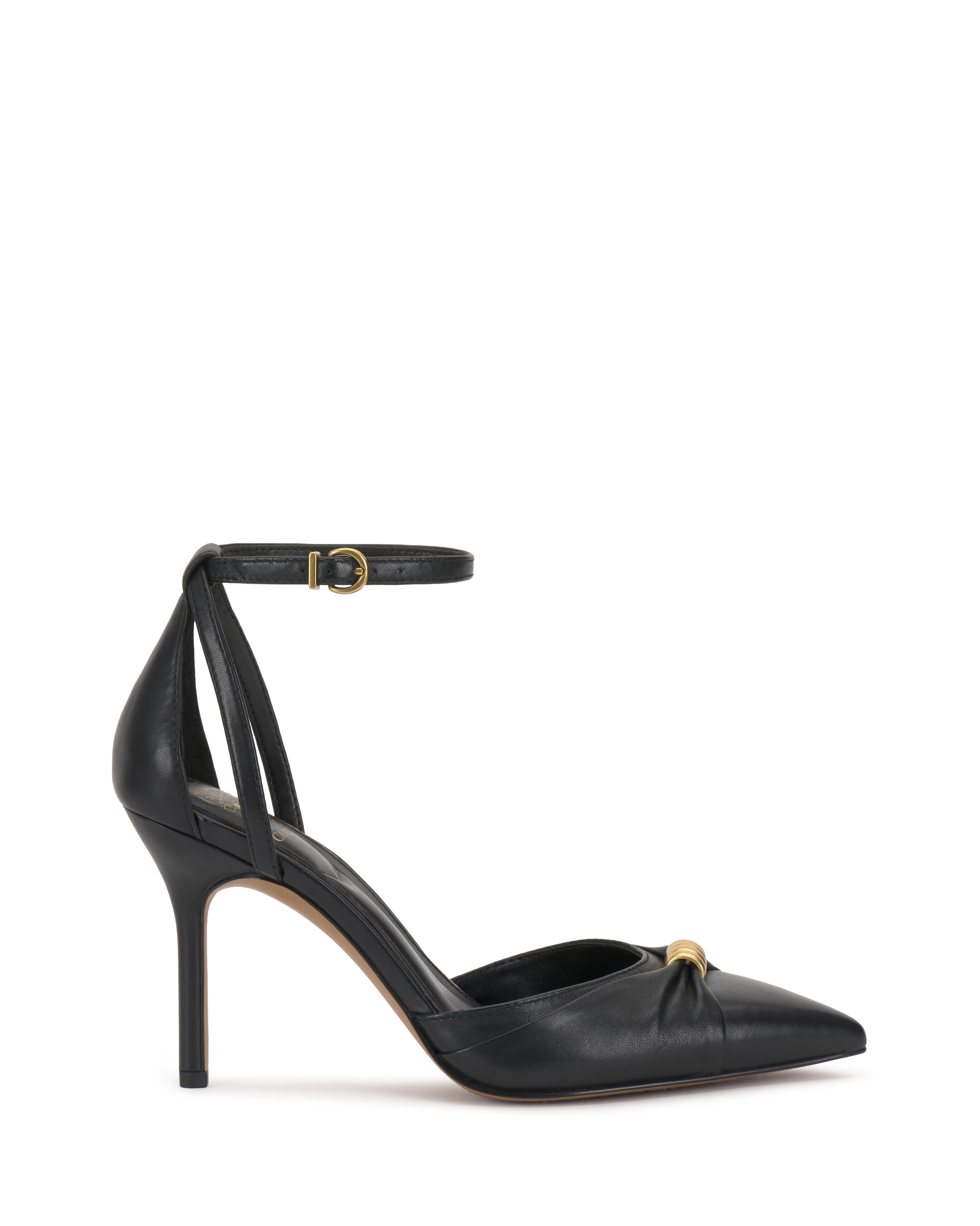 The Vince Camuto Mallie Pump features a black pointed toe, ankle strap with gold buckle, side cutouts, and a stiletto heel. Displayed on a white background.