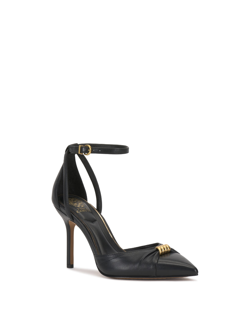 The Vince Camuto Mallie Pump is a black pointed-toe high heel with an ankle strap, gold buckle detail on the toe, slender heel, and a sleek, elegant design.