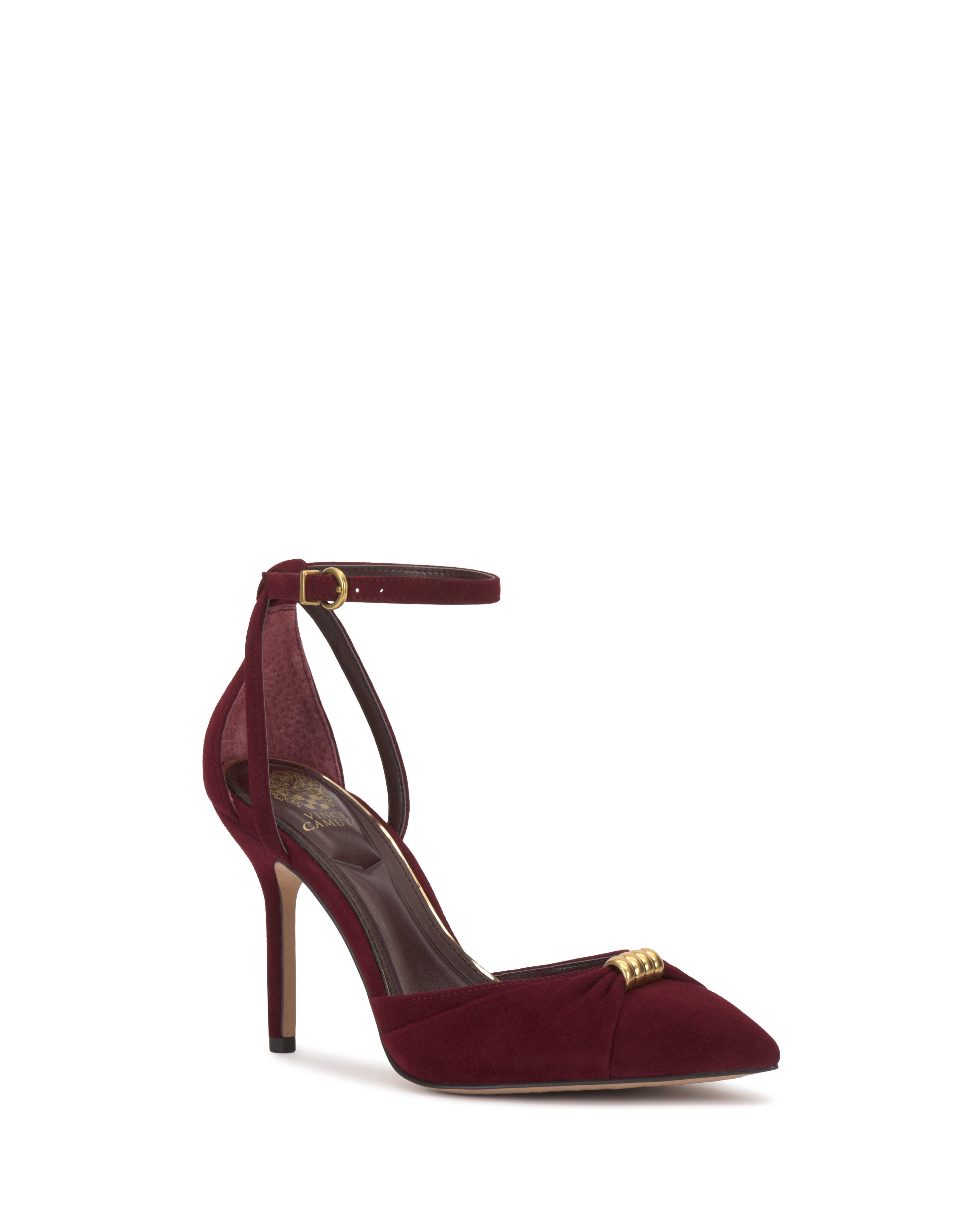 The Vince Camuto Mallie Pump in burgundy suede features a pointed toe, ankle strap, slender heel, and a small gold front accent for added elegance.