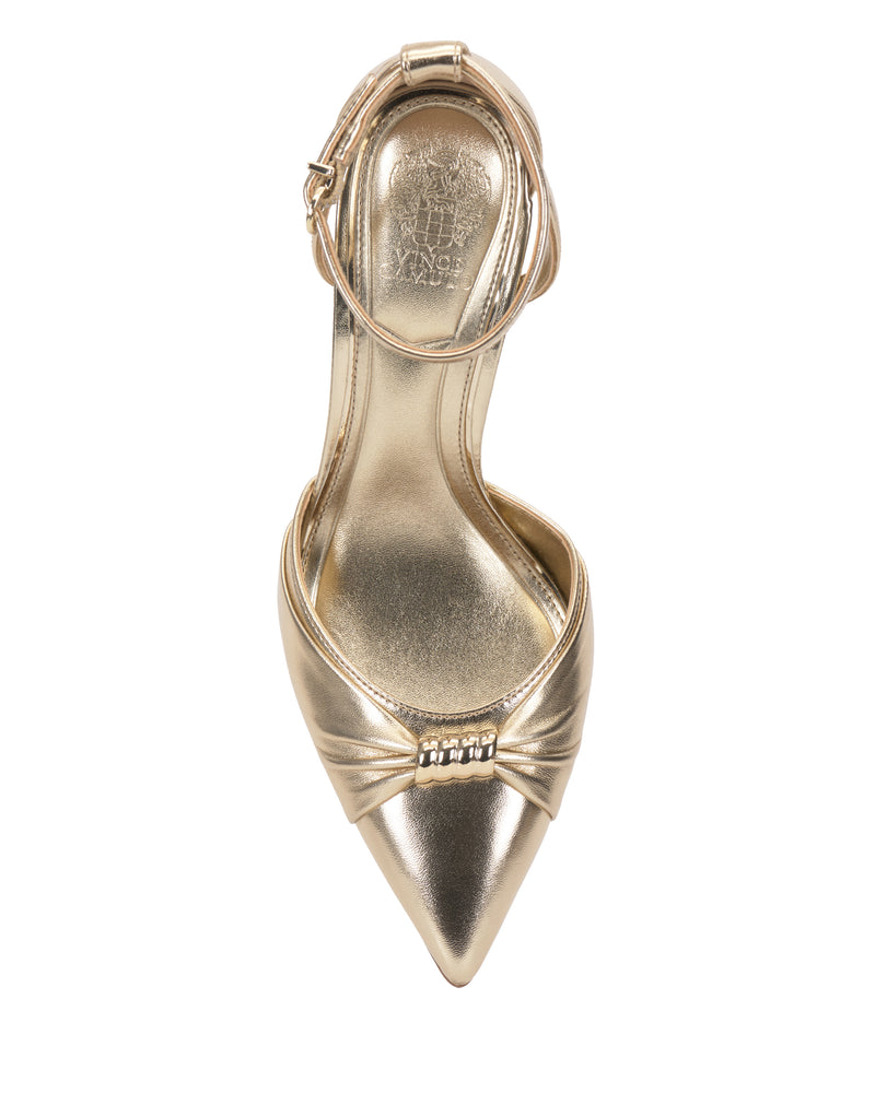 The Vince Camuto Mallie Pump is a gold women’s high-heeled shoe with a pointed toe, front bow detail, rhinestone embellishment, and an ankle strap with buckle, viewed from above.
