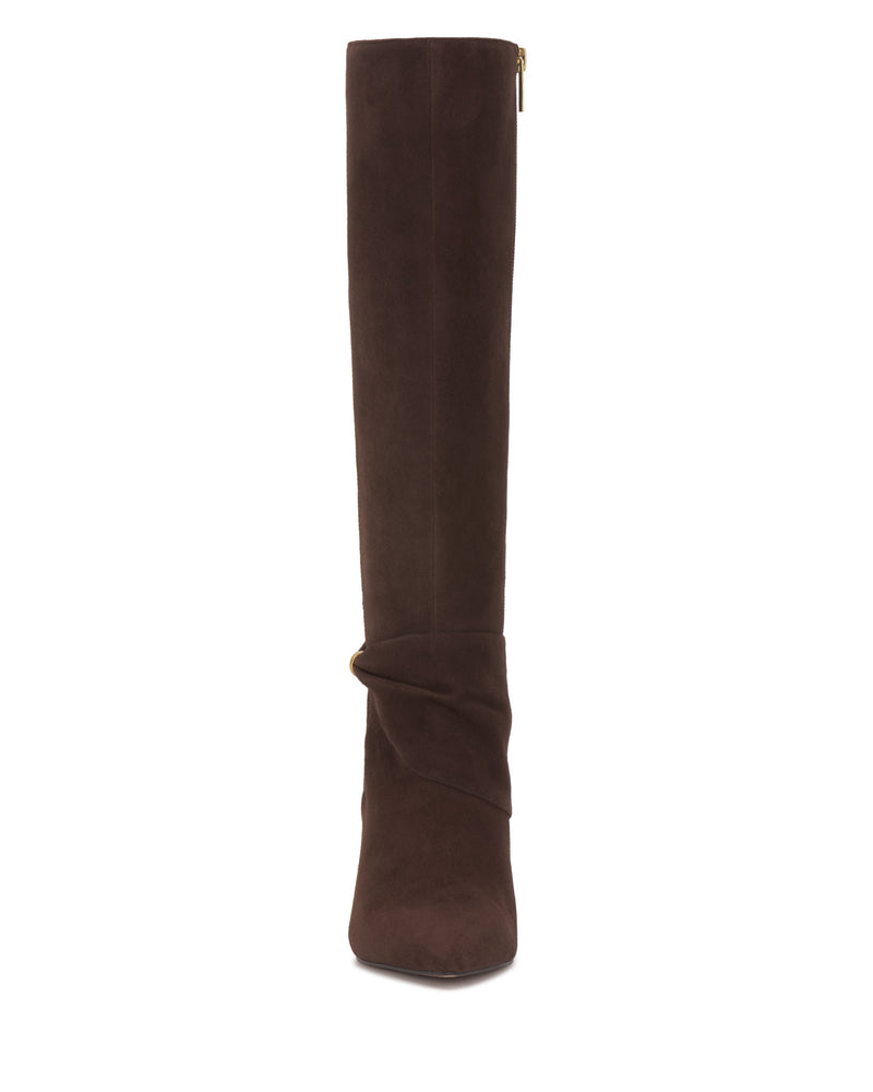 The Vince Camuto Meezo Narrow Calf Knee High Boot features a tall, dark brown suede design with a pointed toe, subtle ankle draping, skinny heel, and side zipper.