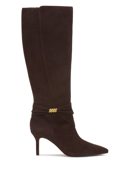 The Vince Camuto Meezo Wide Calf Knee High Boot features dark brown suede, a pointed toe, skinny heel, ankle wraparound detail, and a chic gold hardware accent.