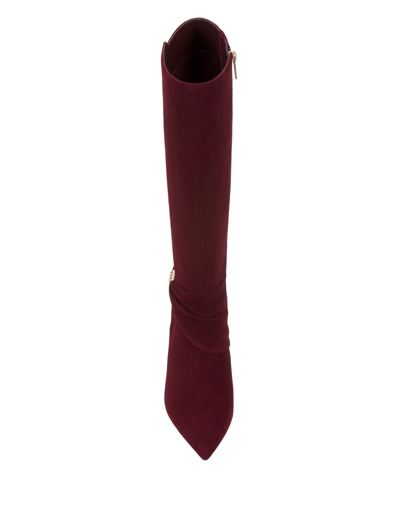 Top view of the Meezo Wide Calf Knee High Boot by Vince Camuto in burgundy suede, featuring a pointed toe, skinny heel, side zipper, and subtle hardware accent against a white background.