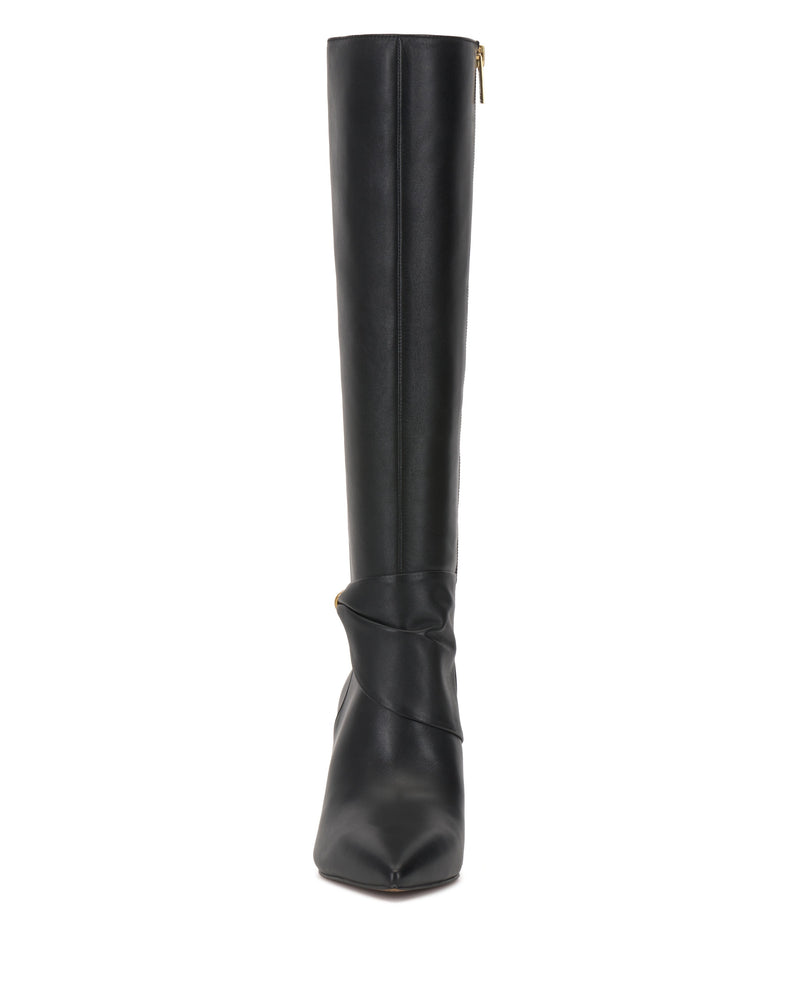 Front view of the Meezo Extra Wide Calf Knee High Boot by Vince Camuto in black, featuring a pointed toe, skinny heel, and a decorative wrap detail around the ankle.