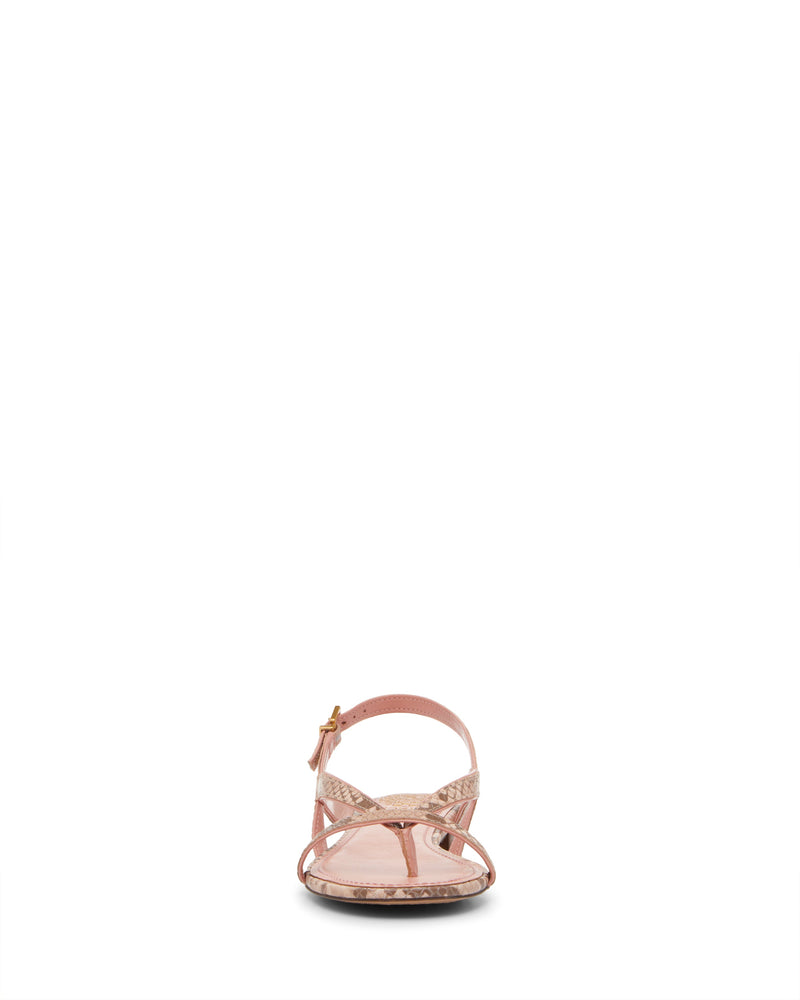 The Melly Sandal by Vince Camuto is shown from the back, highlighting its pink strappy leather design, flat sole, and small buckle on the ankle strap against a plain white background.