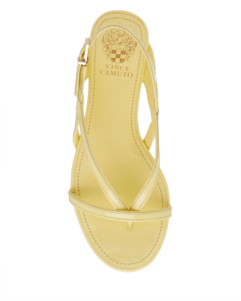 A top view of the light yellow Vince Camuto Melly Sandal, featuring strappy leather design with a thin toe strap, side straps, adjustable ankle strap, and visible brand logo on the insole of this chic block heel.