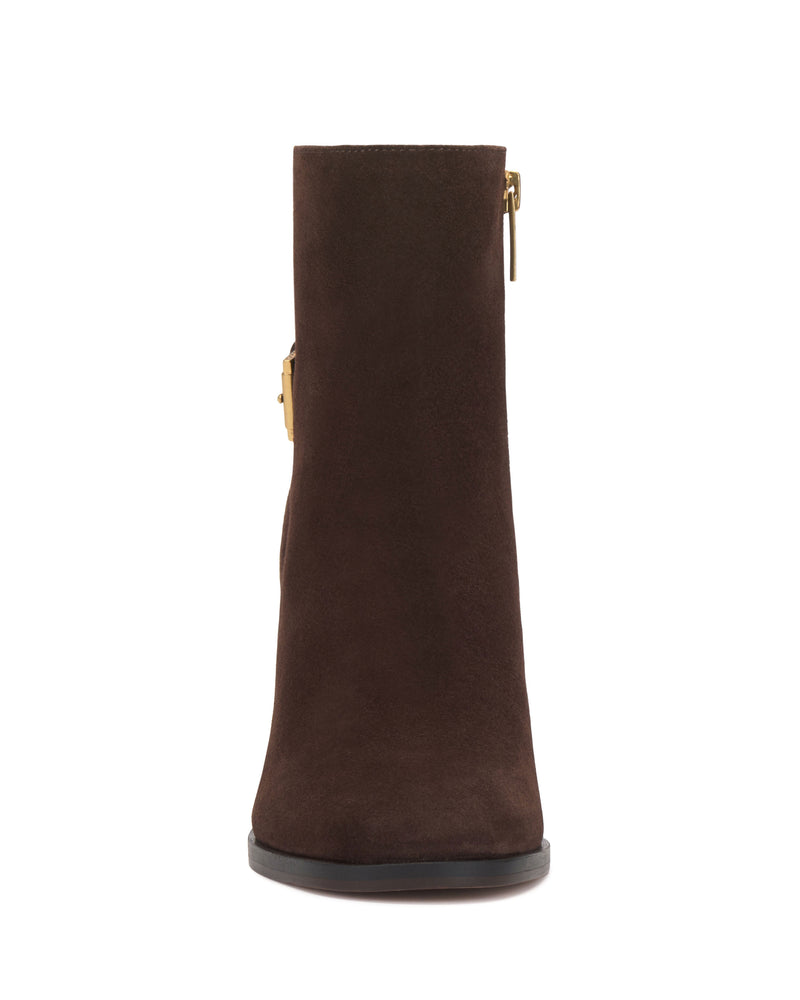 Front view of the Vince Camuto Melvani Bootie in brown suede, featuring a low heel, gold side zipper, and black sole against a white background.