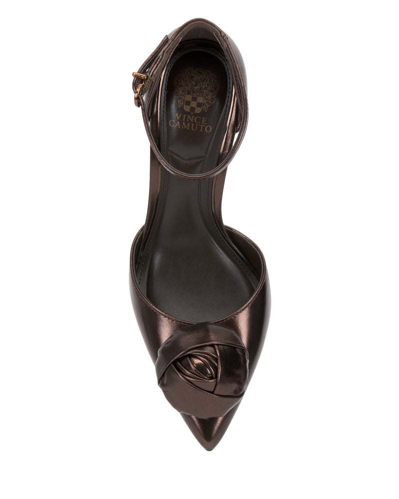 Top view of the Vince Camuto Mirezzo Pump in metallic brown, featuring a stiletto heel, ankle strap, rose detail on the toe, and Vince Camuto logo on the insole.