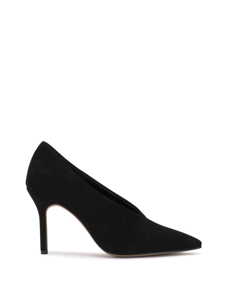 The Vince Camuto Mozlea Pump is a black suede high heel with a pointed toe, slim heel, and subtly curved silhouette, shown in a side profile against a white background.