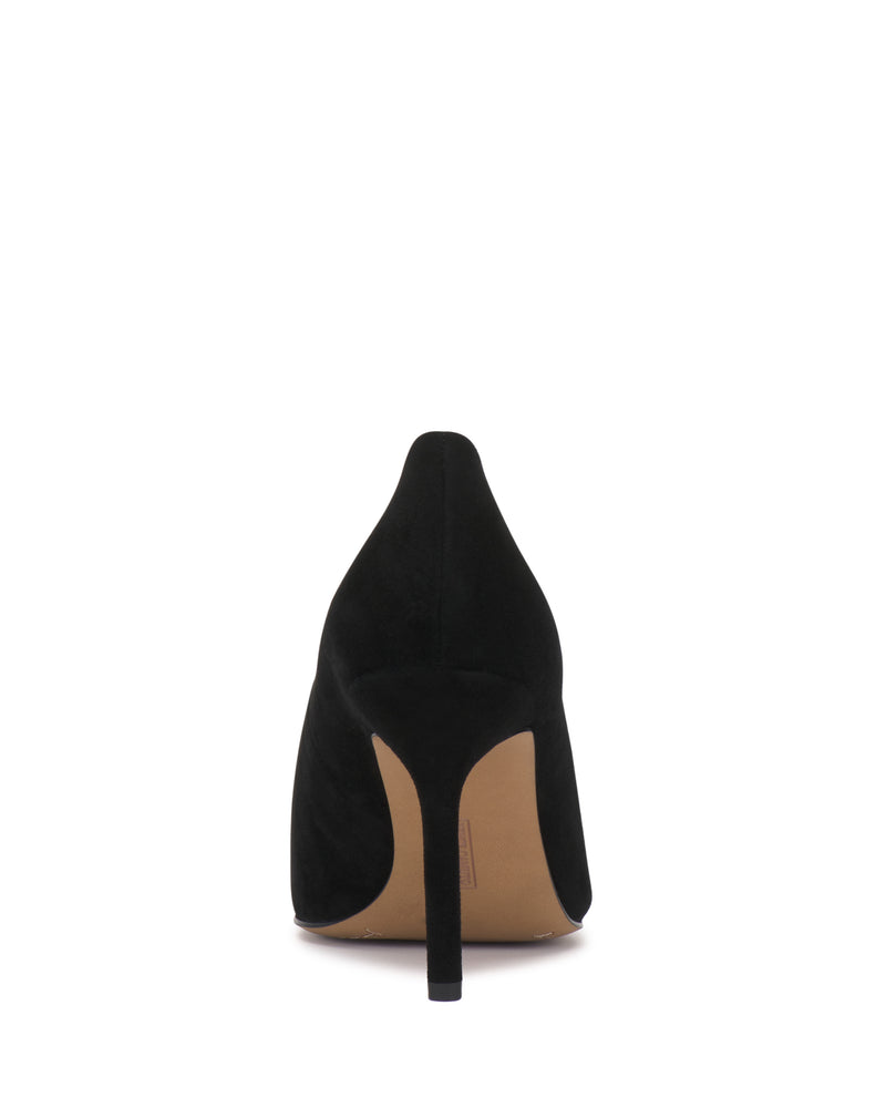 The Vince Camuto Mozlea Pump is showcased from the back, featuring a sleek black finish, a slim stiletto heel, and a slightly pointed toe, set against a white background.
