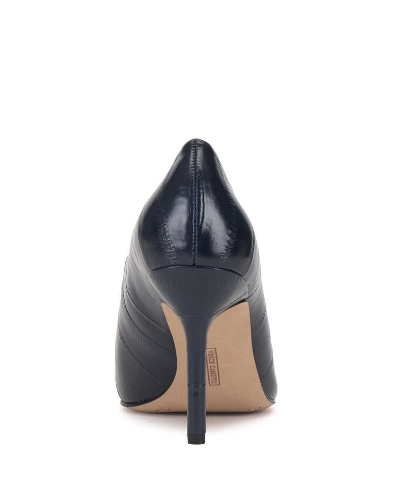 Rear view of the Vince Camuto Mozlea Pump, a black, quilted high-heeled shoe featuring a pointed toe and beige sole, photographed on a white background.