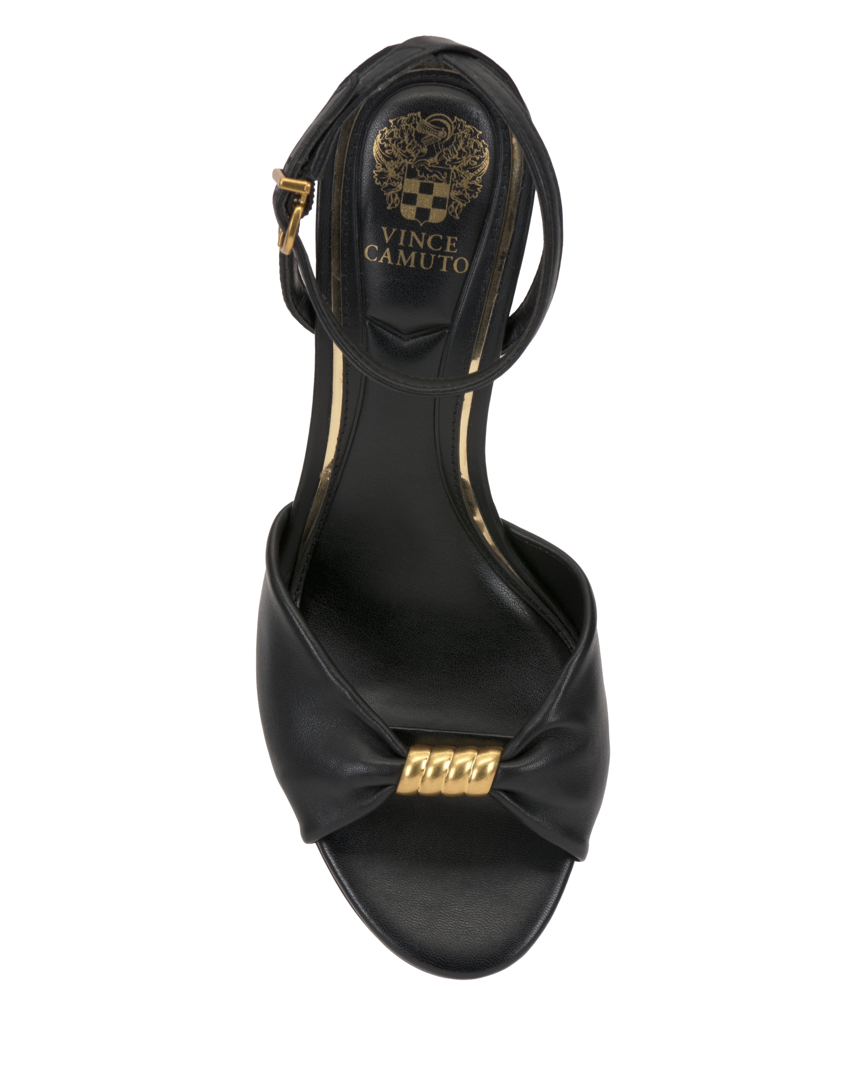 Top view of the Neala Sandal by Vince Camuto, featuring black high heels, an ankle strap with gold buckle, gold chain detail on the front, and a gold Vince Camuto logo on the insole.