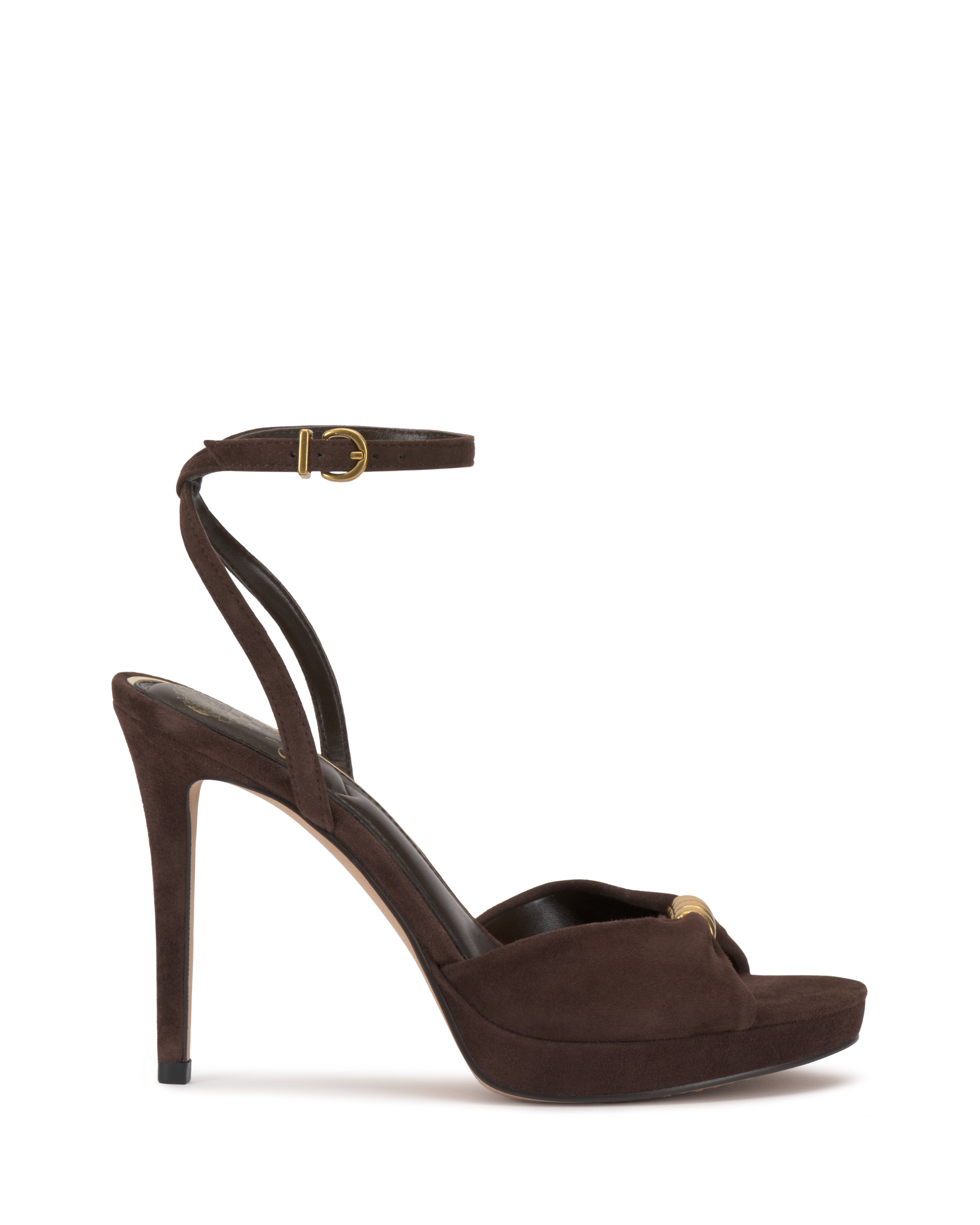 The Vince Camuto Neala Sandal is a dark brown suede high-heeled platform with an ankle strap, gold buckle, and peep-toe design, shown on a white background.