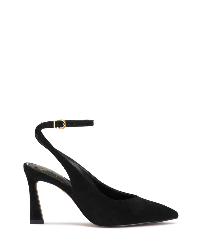 The Vince Camuto Nellah Pump is a black suede high-heeled shoe with a pointed toe and an ankle strap adorned with a gold buckle, displayed on a white background.