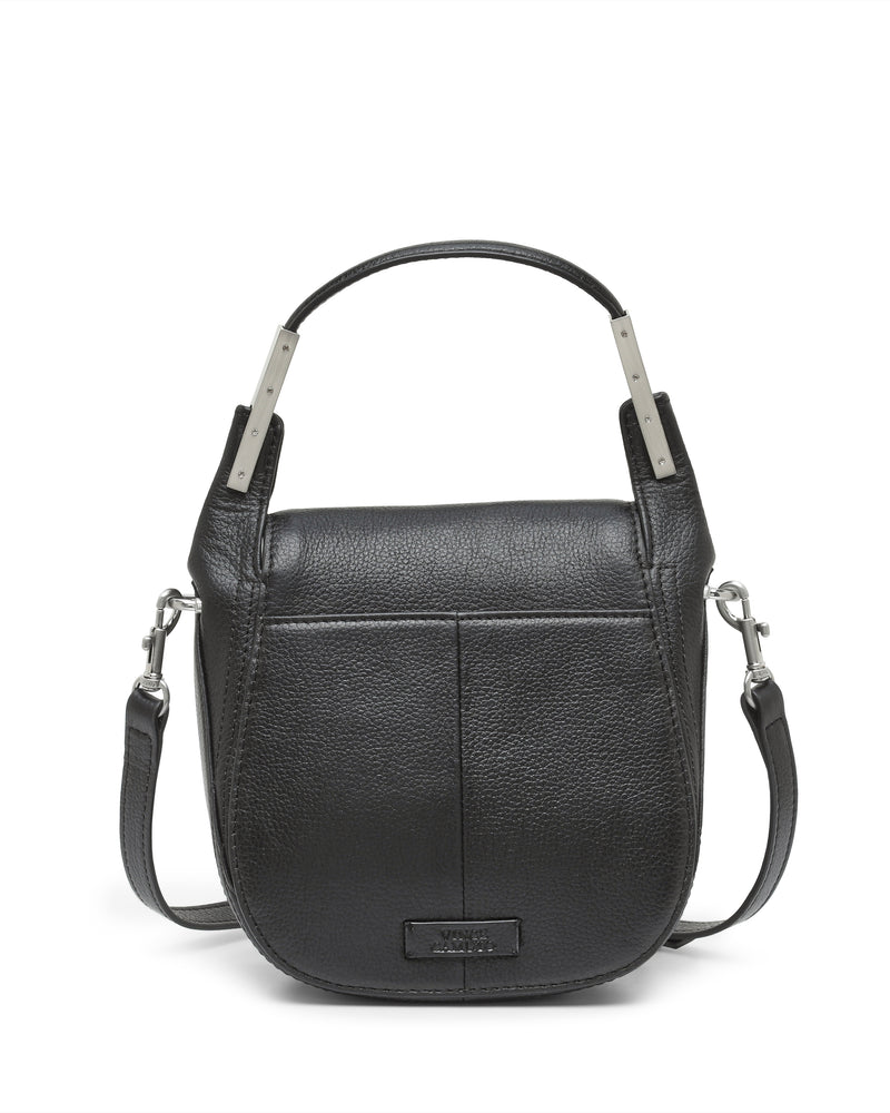 The Vince Camuto Noli Crossbody Bag is a small black leather handbag featuring a short handle, silver hardware, a front pocket, and a detachable shoulder strap, elegantly displayed against a white background.