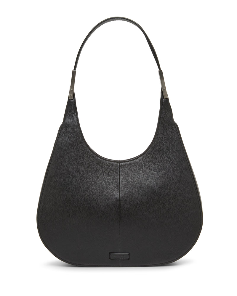 The Noli Hobo Bag by Vince Camuto is a black leather shoulder bag featuring a curved, wide-bottom shape and a single strap. It has minimal detailing, with a small tag at the bottom center.