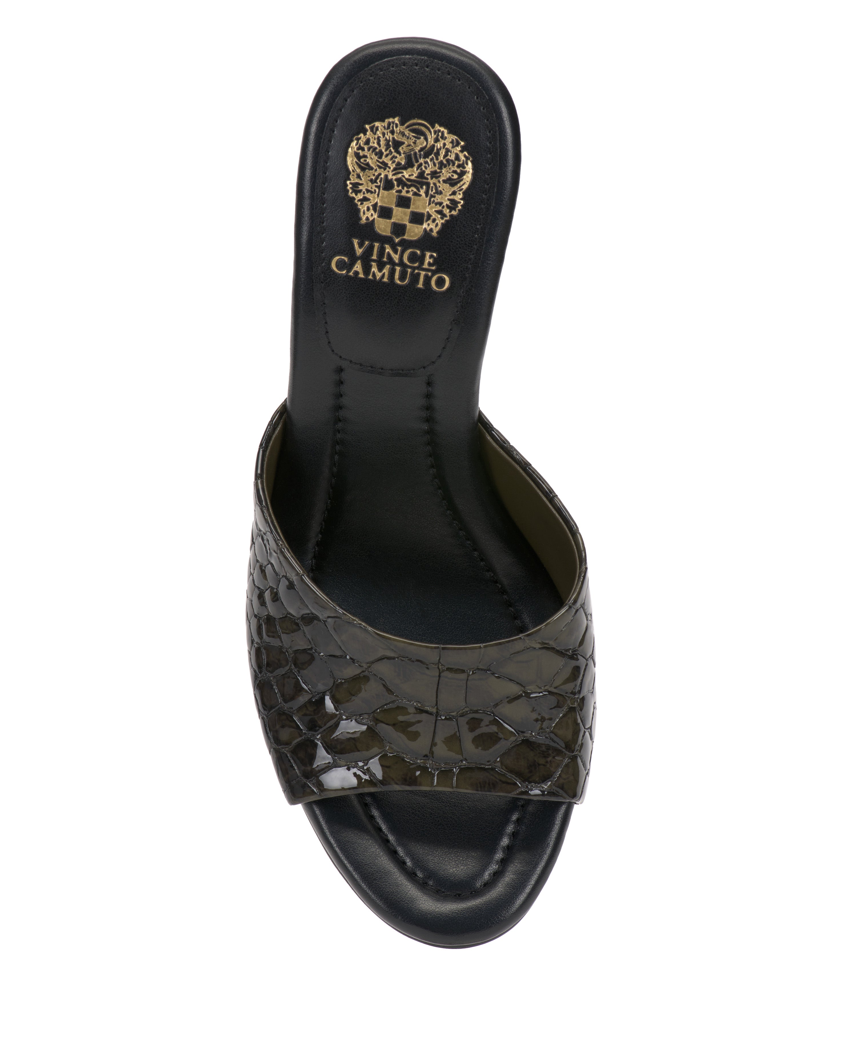 The Paigely Mule by Vince Camuto is a black open-toe sandal with a crocodile texture, wide front strap, flared heel, and gold Vince Camuto branding on the insole.