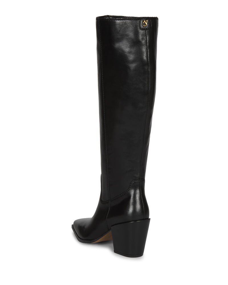 The Pamlia Wide Calf Knee High Boot by Vince Camuto is a black leather boot with a mid-height block heel, pointed toe, and small gold logo near the shaft top—offering an elegant update on classic block heel boots.