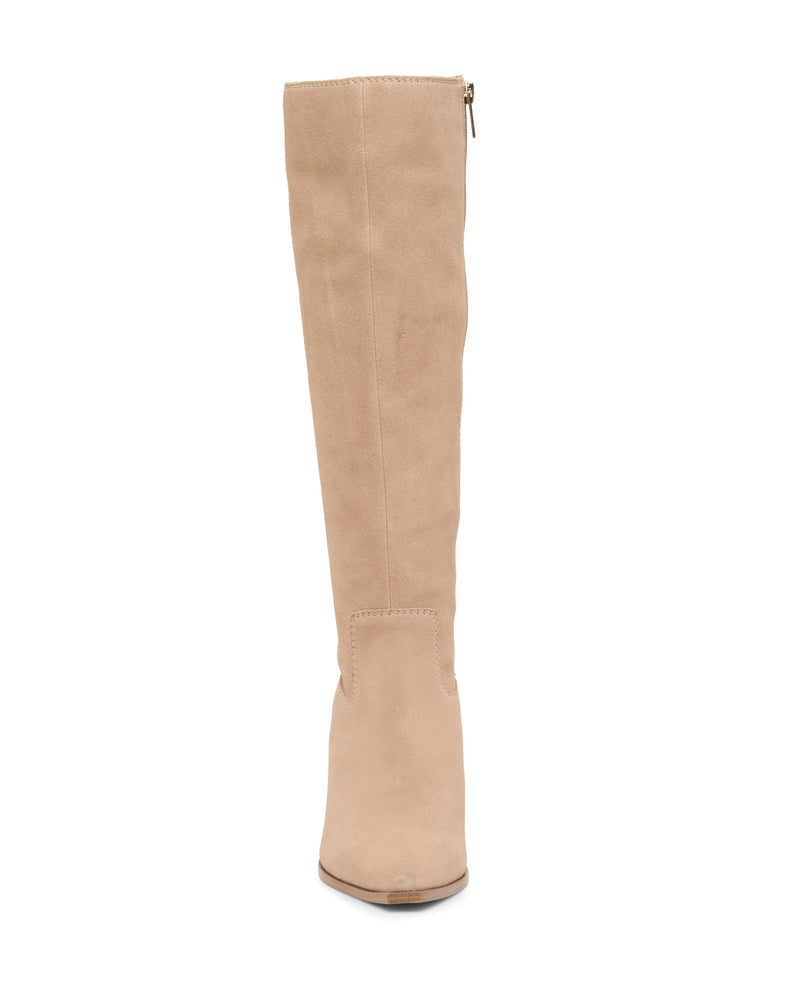 The Vince Camuto Pamlia Wide Calf Knee High Boot is shown from the front in tan suede, with a slightly pointed toe, western-inspired design, and side zipper.