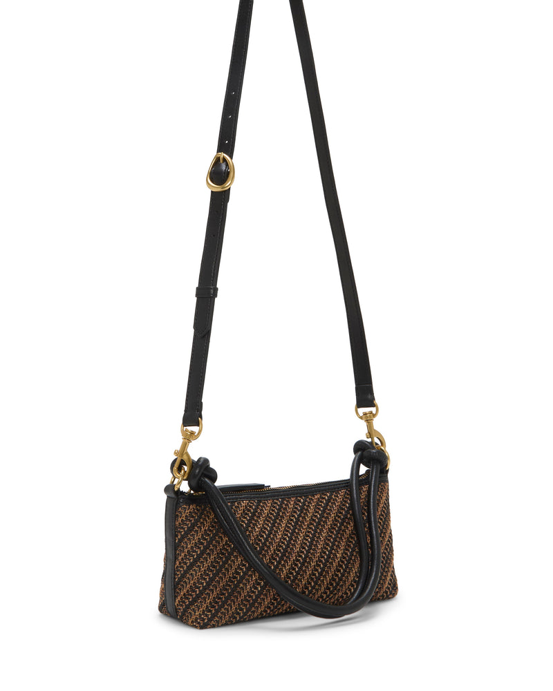 The Vince Camuto Paula Crossbody Bag is a small rectangular bag with a brown and black woven pattern, black adjustable strap, gold-tone hardware, and zippered top.