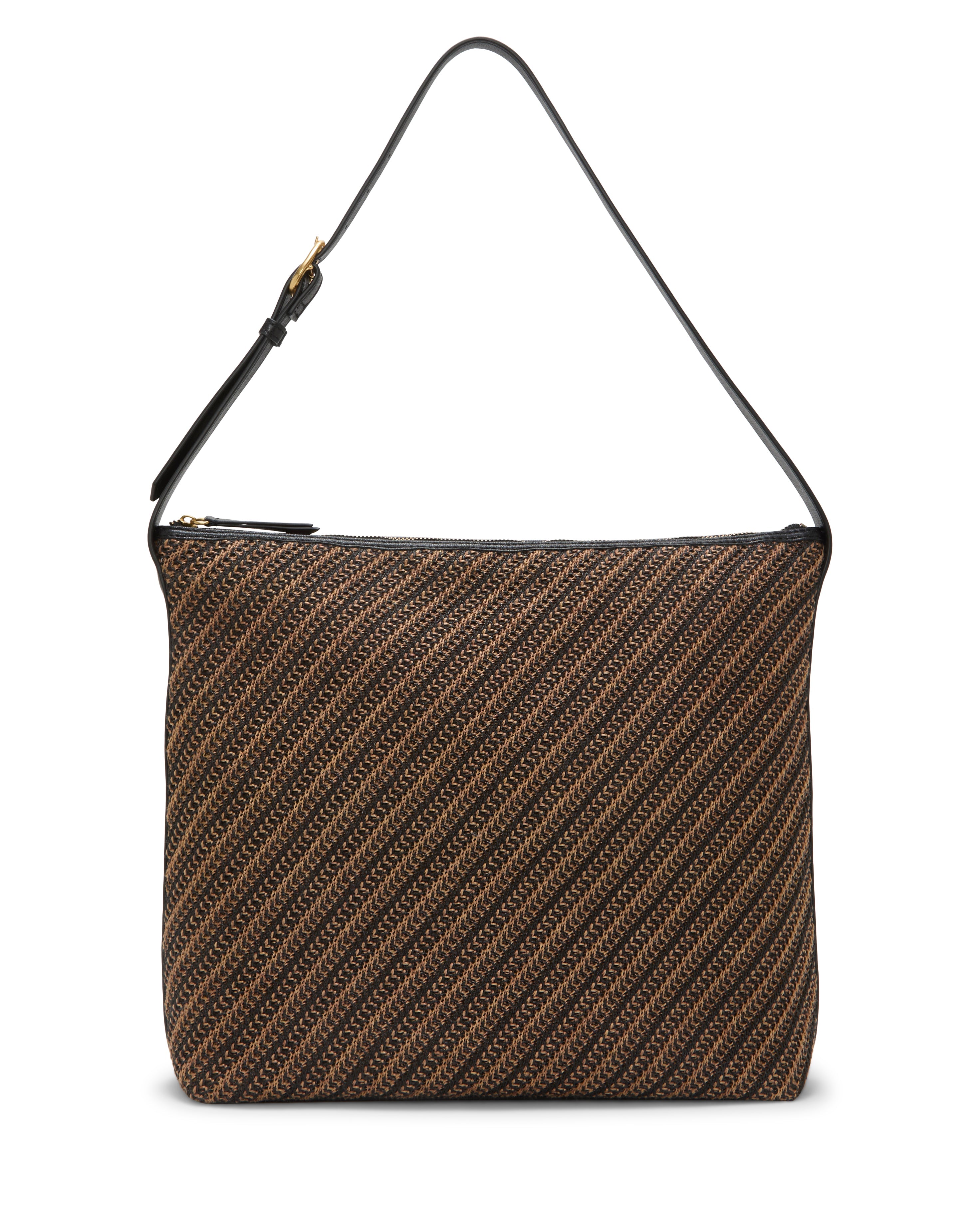 The Paula Shoulder Bag by Vince Camuto features a black and brown diagonal striped woven design, a black adjustable strap, and a top zipper closure—an ideal canvas bag for daily style.