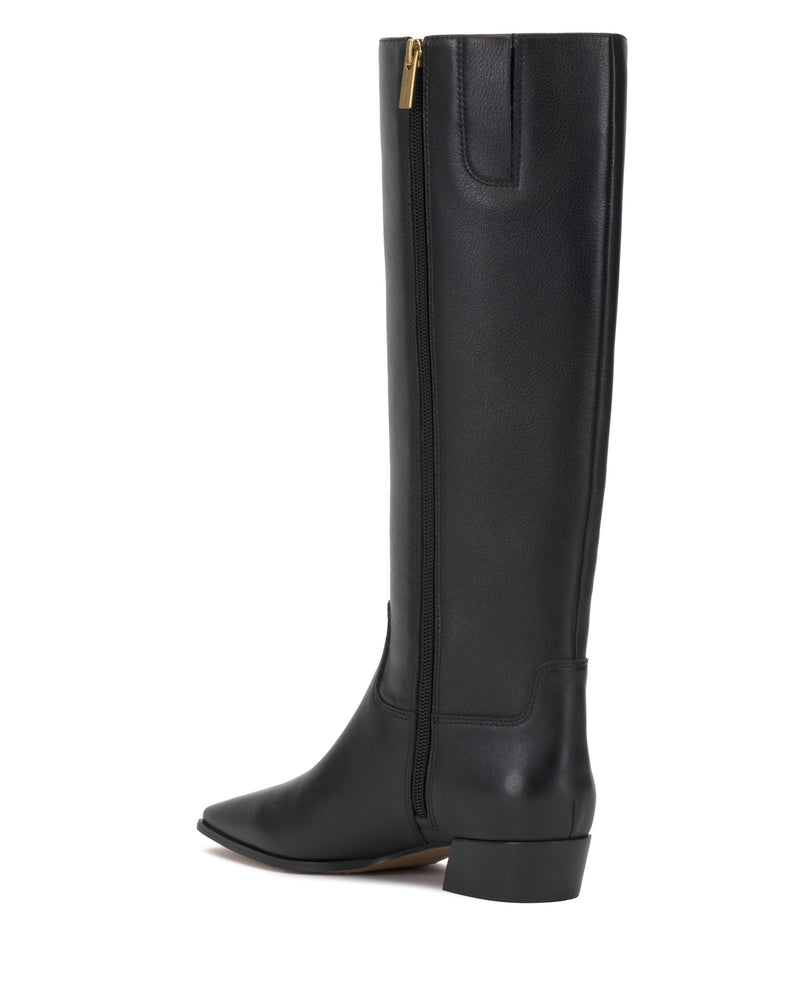 The Pavla Knee High Boot by Vince Camuto is a black western-style boot with a low block heel, pointed toe, and visible side zipper with a gold pull tab, displayed against a white background.