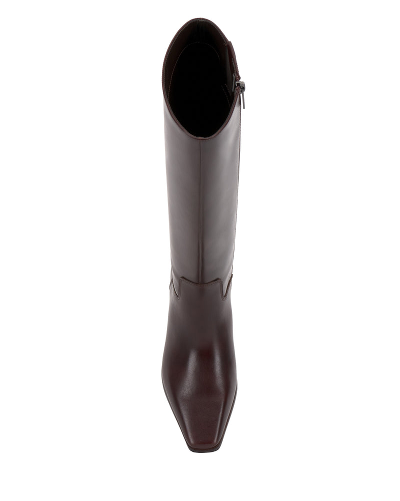 Top view of the Vince Camuto Pavla Knee High Boot in dark brown leather, featuring a pointed toe, western styling, low block heel, and side zipper, displayed against a white background.