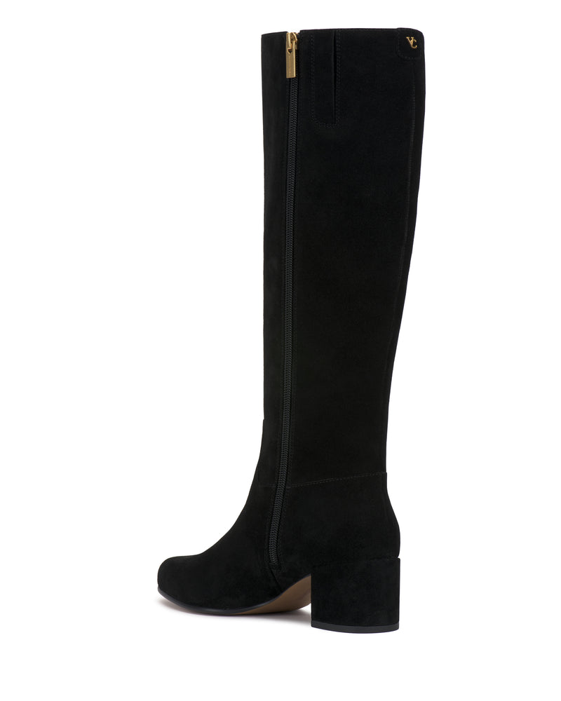 The Vince Camuto Pazzla Extra Wide Calf Knee High Boot is a single black suede boot featuring a block heel, side zipper, and a small gold logo near the top.