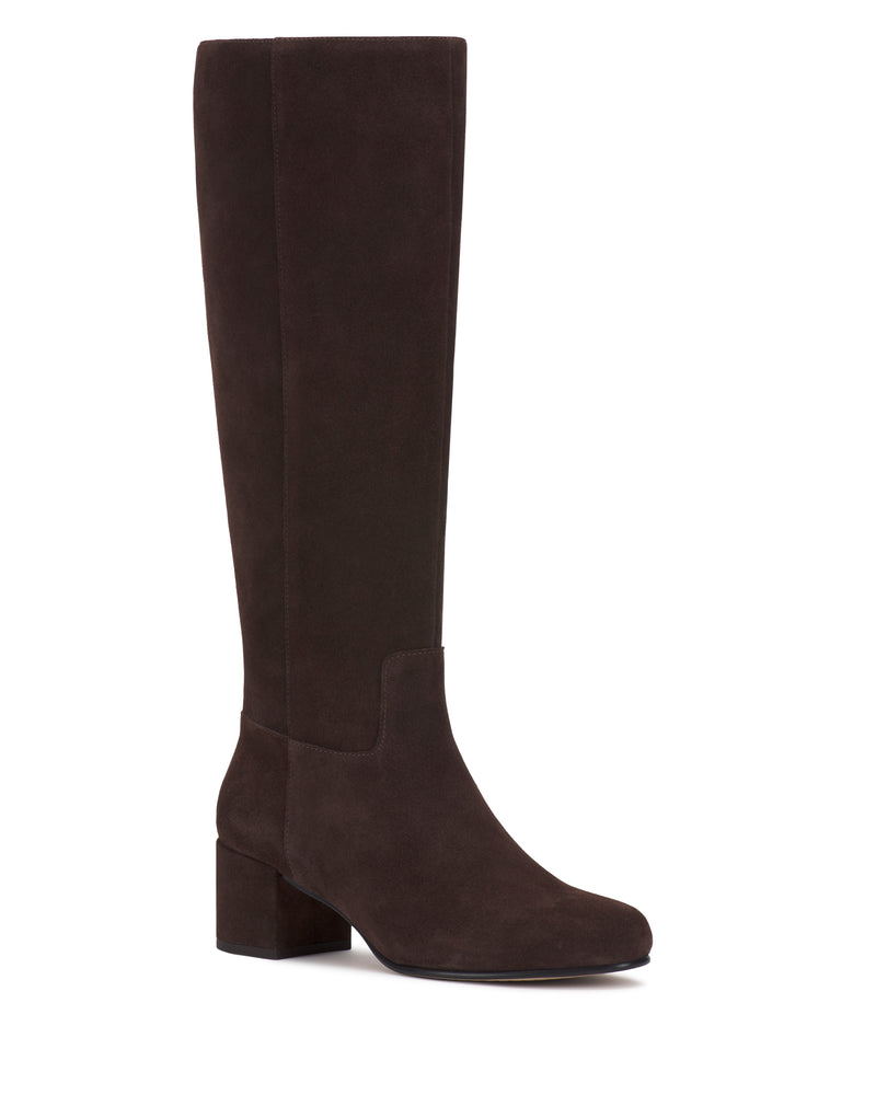The Vince Camuto Pazzla Knee High Boot is a single dark brown suede boot featuring a low block heel, rounded toe, and minimalist design, displayed against a white background.