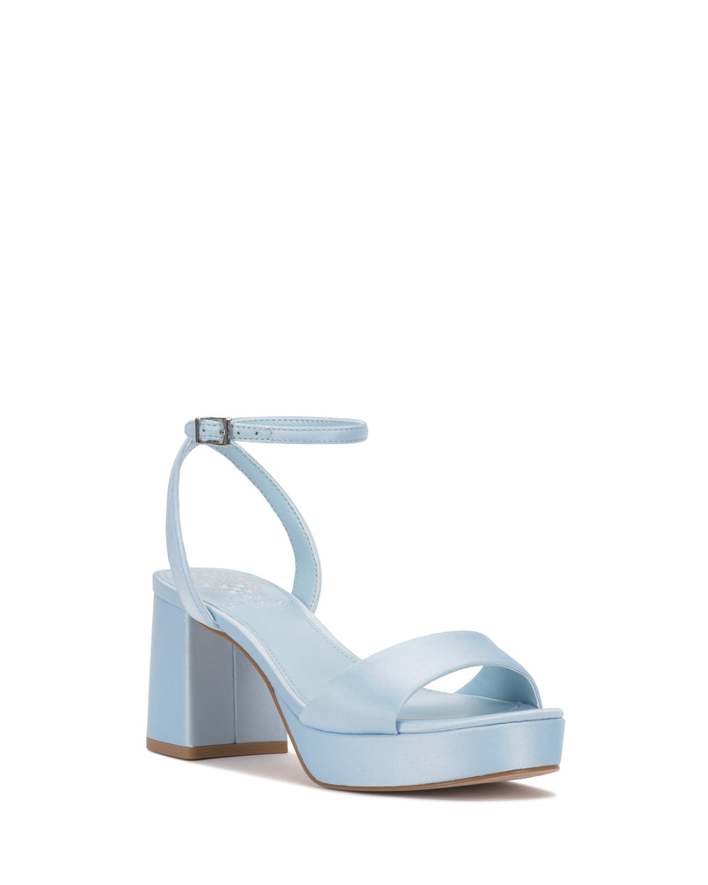 The Pendreya Platform Sandal by Vince Camuto features a light blue retro design with a chunky block heel, ankle buckle strap, wide toe strap, open toe, and platform sole for vintage-inspired style.