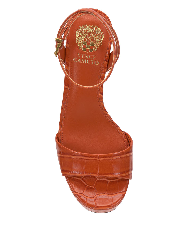 Top view of the Vince Camuto Pendreya Platform Sandal in orange, featuring a crocodile pattern, retro block heel, ankle strap with gold buckle, and gold brand logo on the insole.