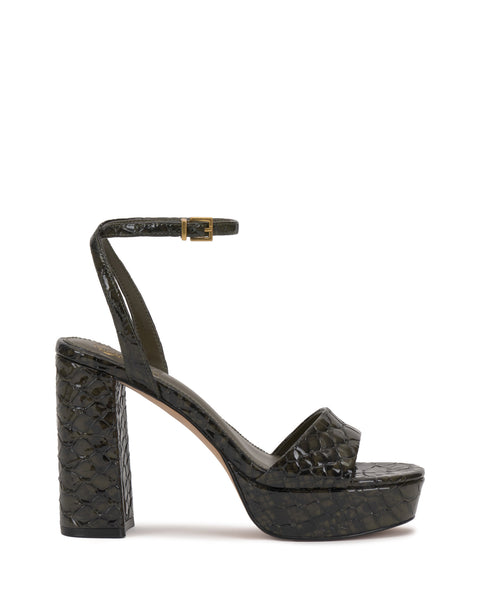 The Pendry Platform Sandal by Vince Camuto features a chunky block heel, olive green faux snakeskin, a toe strap, and a gold-buckled ankle strap—ideal for channeling chic ’70s style.